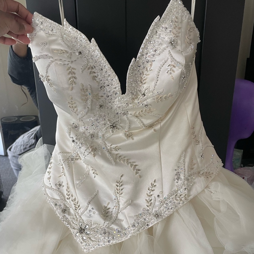 Beautiful bedazzled cream colored wedding dress